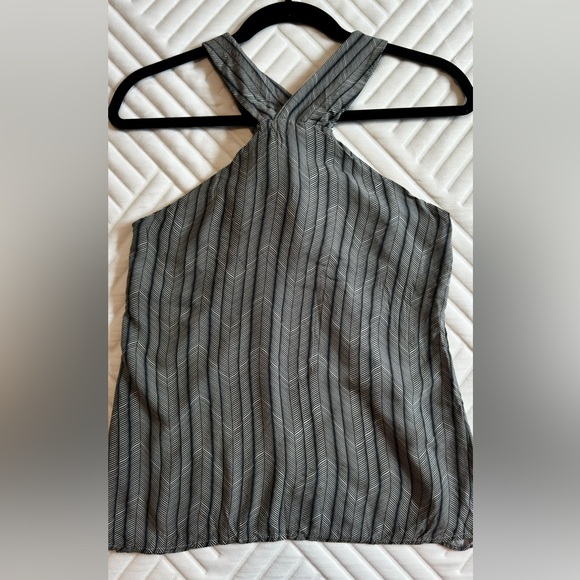 Elegant blouse features a unique design in navy blue tones. - Picture 2 of 4